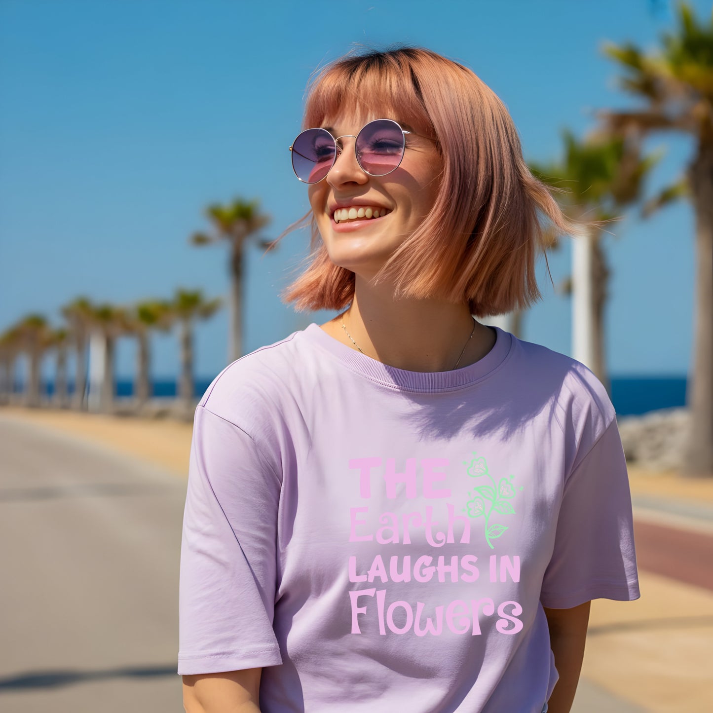Earth Laughs in Flowers T-Shirt — Floral Nature Quote Tee