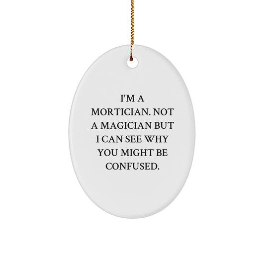 Mortician Gifts from Friends, Funny Oval Ornament, 'I'm A Mortician. Not A Magician But I Can See Why You Might Be Confused.' for Christmas Unique Mortician Gifts - Image 1